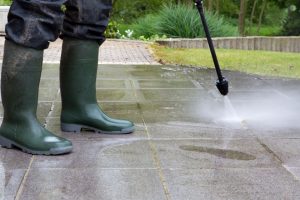 Outdoor floor cleaning with high pressure water jet